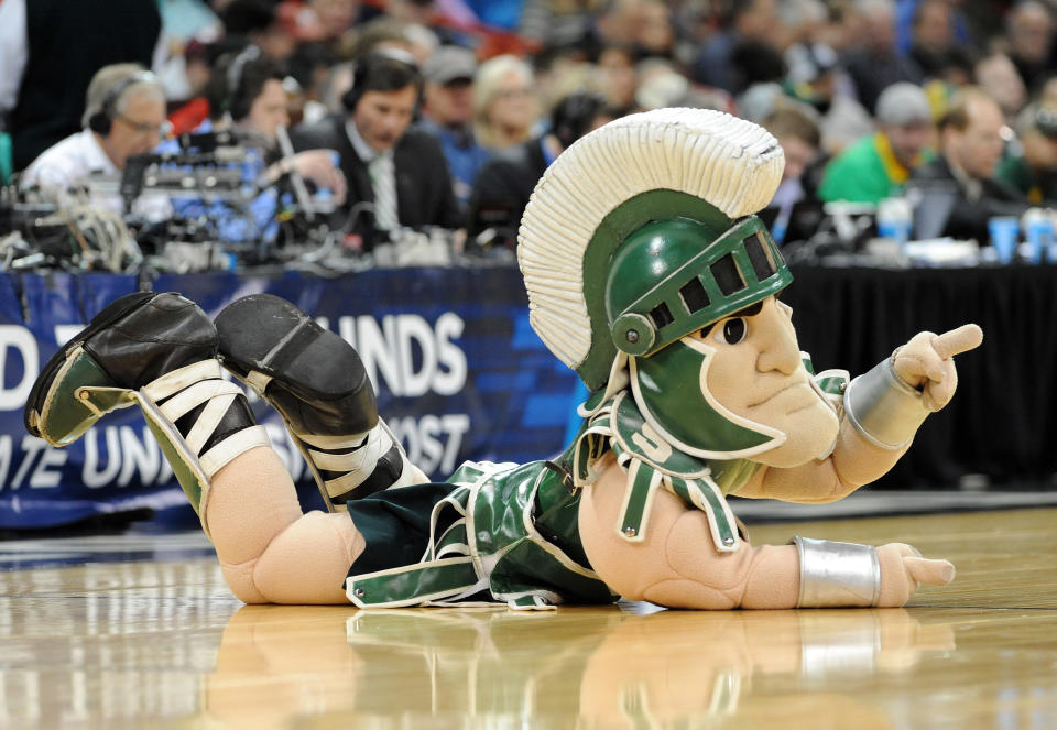 SPOKANE, WA - MARCH 20:  The Michigan State Spartans mascot cheers on his team during their game against the Delaware Fightin Blue Hens in the second round of the 2014 NCAA Men's Basketball Tournament at Spokane Veterans Memorial Arena on March 20, 2014 in Spokane, Washington.  (Photo by Steve Dykes/Getty Images)