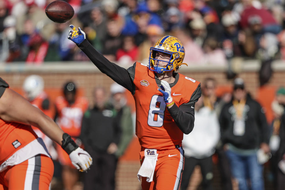 National Team quarterback Kenny Pickett, of Pittsburgh, throws a pass during the first half of an NCAA Senior Bowl college football game, Saturday, Feb. 5, 2022, in Mobile, Ala. (AP Photo/Butch Dill)