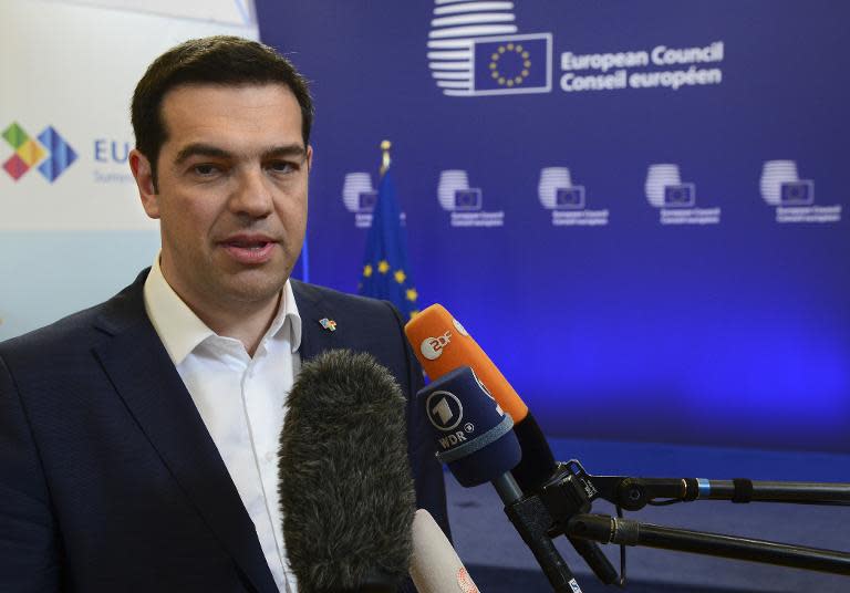 Greek Prime Minister Alexis Tsipras has accused creditors of trying to "humiliate" his country and said the IMF bore "criminal responsibility" for austerity measures that plunged it into recession