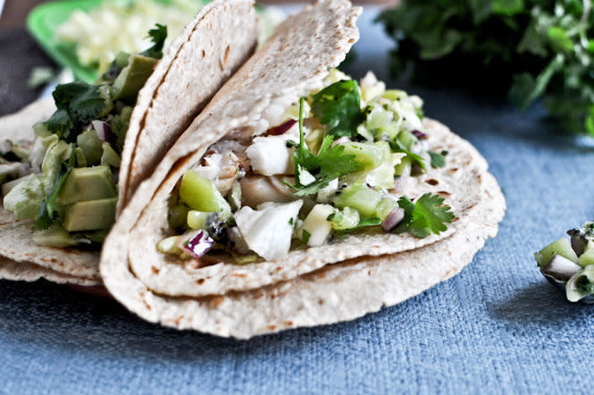 <strong>Get the recipe for <a href="http://www.howsweeteats.com/2012/02/grilled-coconut-lime-tilapia-tacos-with-kiwi-salsa/" target="_blank" rel="noopener noreferrer">grilled coconut lime tilapia tacos with kiwi salsa</a> by How Sweet Eats.</strong>