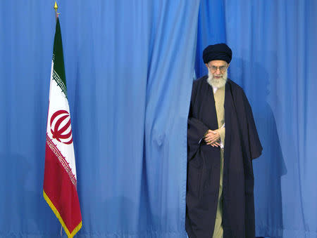 FILE PHOTO: Supreme Leader Ayatollah Ali Khamenei arrives to cast his ballot in Iran's Parliamentary election in Tehran, Iran, March 14, 2008. To match Insight IRAN-CONTRACTS/ REUTERS/Caren Firouz/File Photo