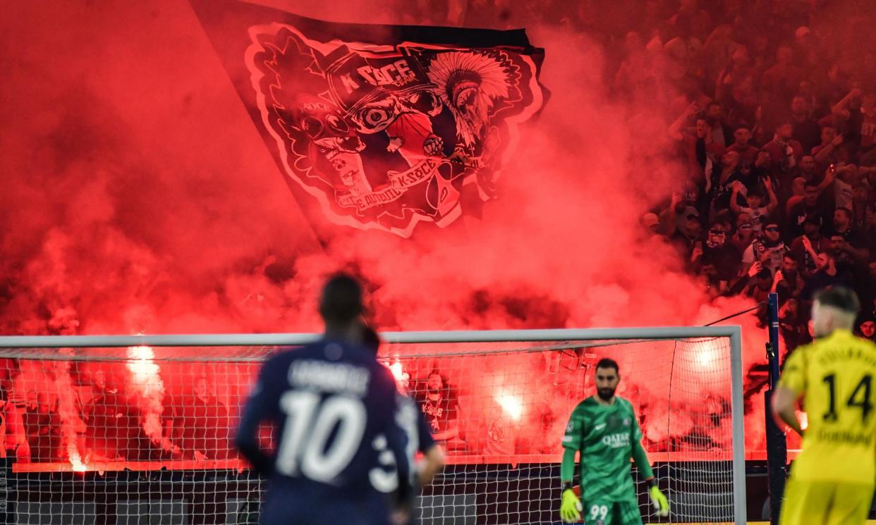 <span>There was plenty of smoke wafting around the Parc des Princes on Tuesday evening.</span><span>Photograph: Abdullah Firas/Abaca/Shutterstock</span>