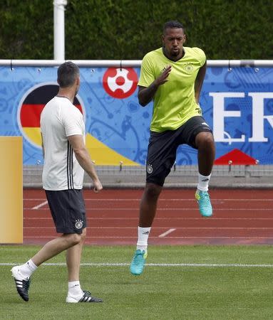 Football Soccer - Euro 2016 - Germany Training - Stade Camille Fournier, Evian-Les-Bains, France - 25/6/16 - Germany's Jerome Boateng and fitness coach Shad Forsythe during training. REUTERS/Denis Balibouse