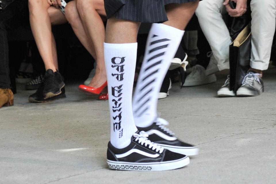 Vans with graphic socks at Off-White spring ’17 during Paris Fashion Week in June 2016. - Credit: WWD