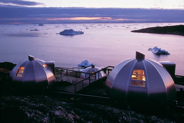 Courtesy of Hotel Arctic The igloo-style guest rooms at Greenland’s Hotel Arctic overlook Ilulissat Icefjord.