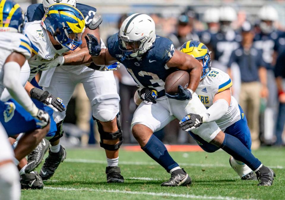 Delaware defenders can’t stop Penn State running back Kaytron Allen during the game on Saturday, Sept. 9, 2023.