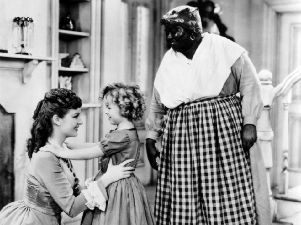 Actress Shirley Temple, Evelyn Venable, and Hattie McDaniel in a scene from the movie "The Little Colonel"