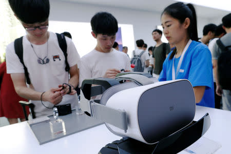 FILE PHOTO: A new Xiaomi VR headset is displayed during a product launch in Shenzhen, China May 31, 2018. REUTERS/Bobby Yip