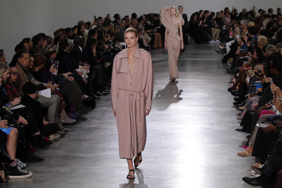 A model wears a creation for Schiaparelli Haute Couture Spring/Summer 2020 fashion collection presented Monday Jan.20, 2020 in Paris (AP Photo/Francois Mori)