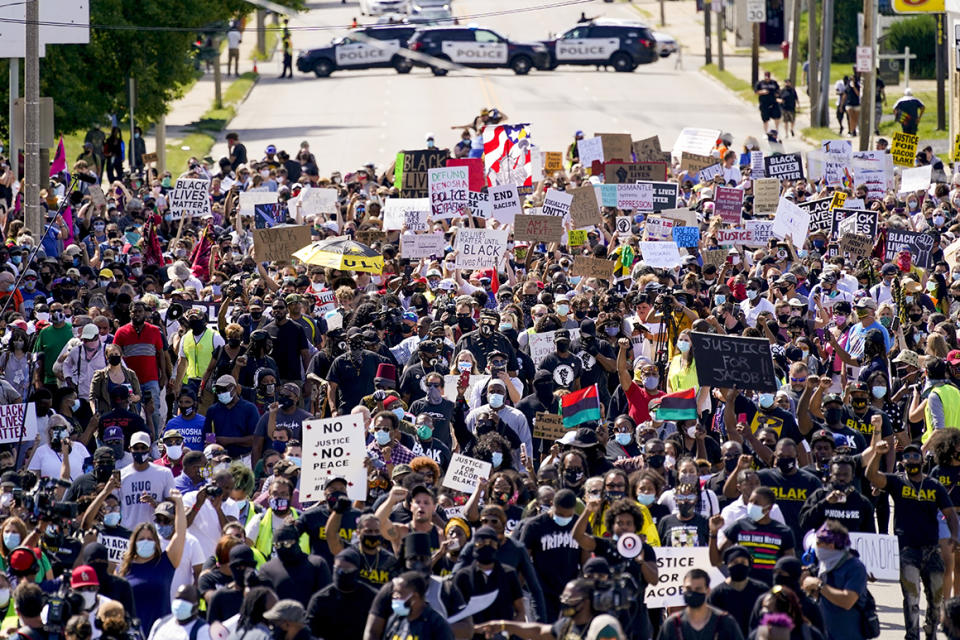 Hundreds march at a rally for Jacob Blake Saturday, Aug. 29, 2020, in Kenosha, Wis. 