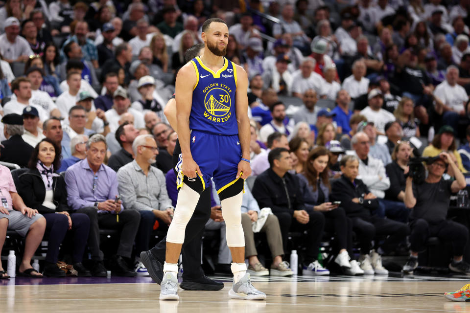 SACRAMENTO, CALIFORNIA - APRIL 16: Stephen Curry #30 of the Golden State Warriors stands on the court during the end of the the second half of their loss to the Sacramento Kings during the Play-In Tournament at Golden 1 Center on April 16, 2024 in Sacramento, California. NOTE TO USER: User expressly acknowledges and agrees that, by downloading and or using this photograph, User is consenting to the terms and conditions of the Getty Images License Agreement. (Photo by Ezra Shaw/Getty Images)