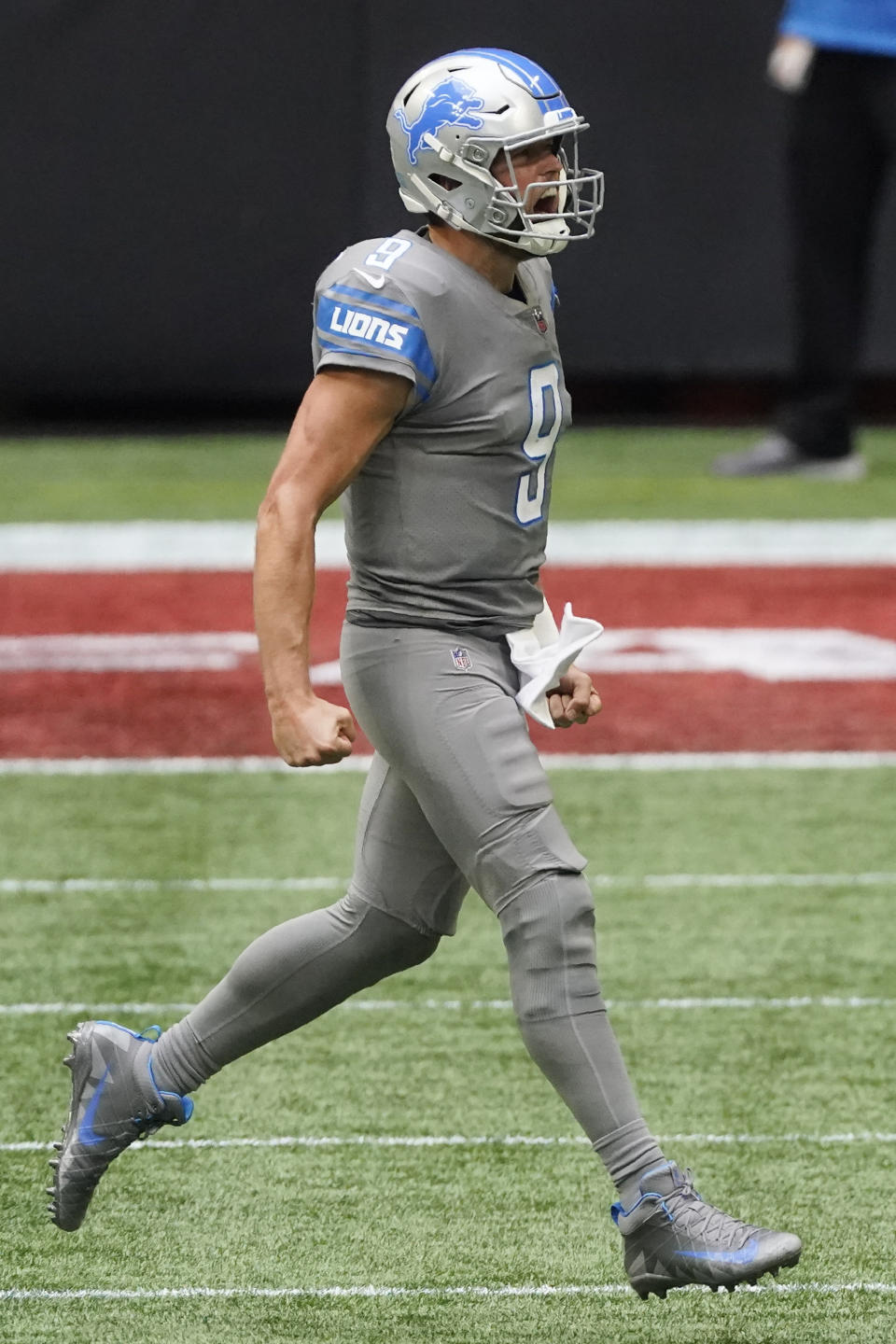 Detroit Lions quarterback Matthew Stafford (9) celebrates victory during the second half of an NFL football game against the Atlanta Falcons, Sunday, Oct. 25, 2020, in Atlanta. The Detroit Lions won 23-22. (AP Photo/John Bazemore)