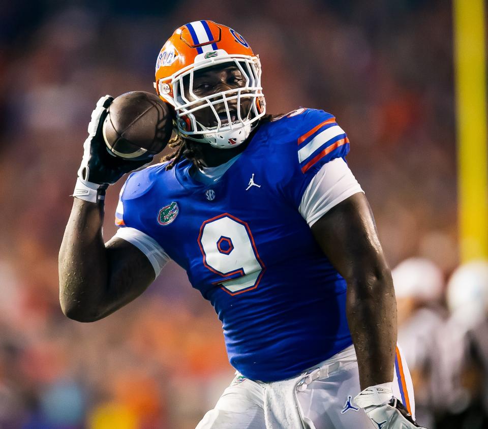 Florida Gators defensive lineman Gervon Dexter Sr. (9) celebrates his interception that lead to a touchdown in the first half at Steve Spurrier Field at Ben Hill Griffin Stadium in Gainesville, FL on Saturday, September 10, 2022. [Doug Engle/Gainesville Sun]