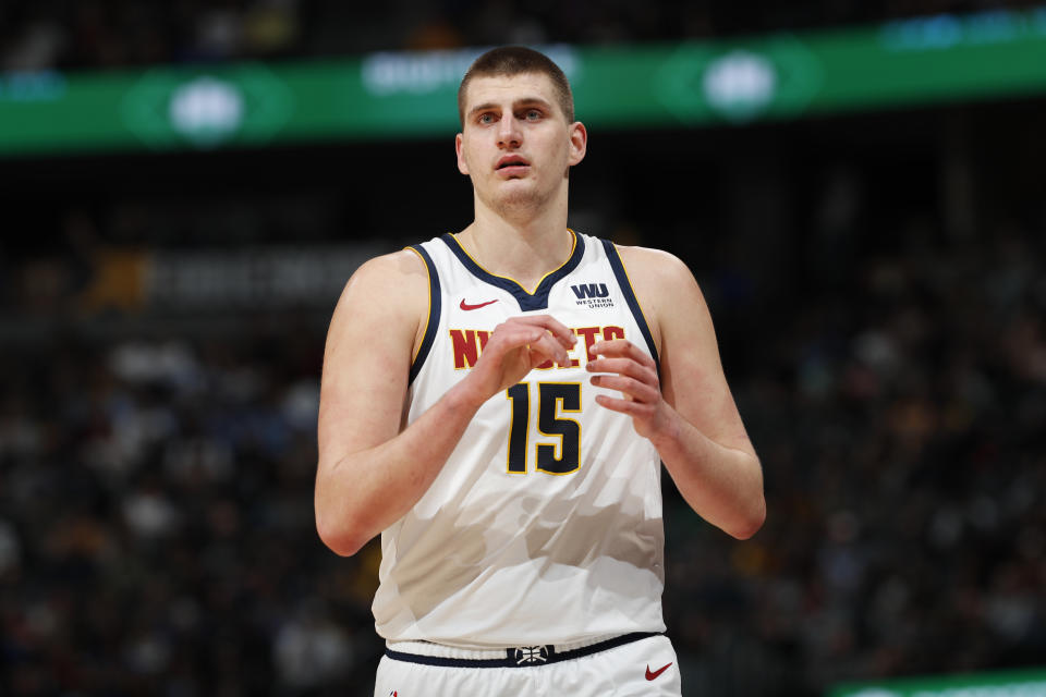 Denver Nuggets center Nikola Jokic (15) in the first half of an NBA basketball game Tuesday, March 26, 2019, in Denver. (AP Photo/David Zalubowski)