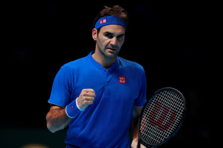 Tennis - ATP Finals - The O2, London, Britain - November 15, 2018 Switzerland's Roger Federer celebrates winning his group stage match against South Africa's Kevin Anderson Action Images via Reuters/Andrew Couldridge