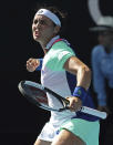 Tunisia's Ons Jabeur reacts after winning a point against China's Wang Qiang during their fourth round singles match at the Australian Open tennis championship in Melbourne, Australia, Sunday, Jan. 26, 2020. (AP Photo/Dita Alangkara)