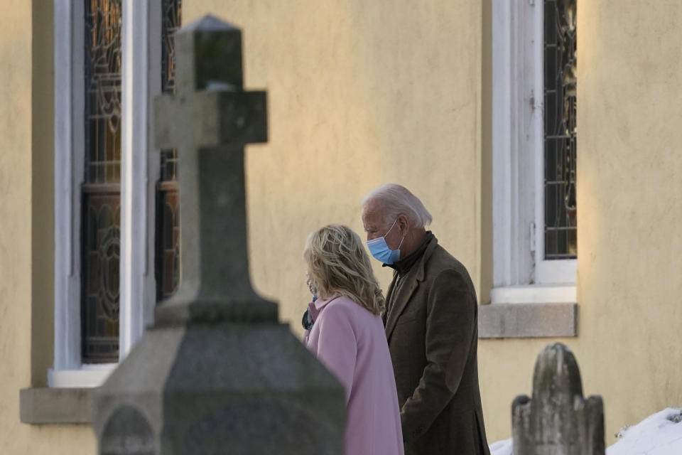 FILE - In this Dec. 18, 2020, file photo President-elect Joe Biden and his wife Jill Biden walk from St. Joseph on the Brandywine Roman Catholic Church in Wilmington, Del. Biden says Americans should be allowed to attend church during the pandemic “safely,” and his transition team has underscored the importance of heeding local restrictions. Still, if he does become a regular Washington churchgoer, Biden will have plenty of choices. (AP Photo/Carolyn Kaster, File)