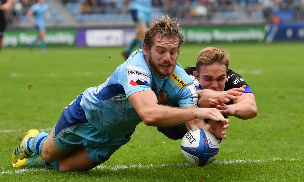 Gareth Steenson of Exeter dives on a through ball to score his side’s third try