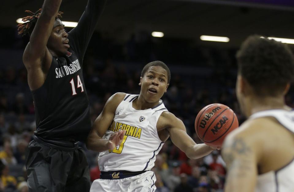 Cal transfer Charlie Moore will be the heir apparent for Kansas at point guard. (AP)