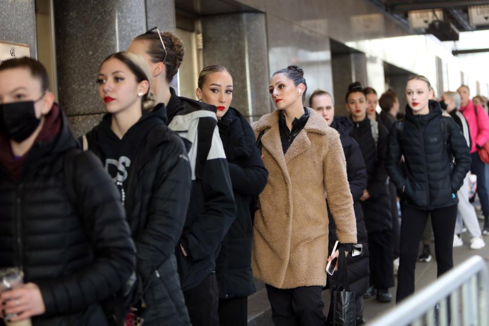 Dancers wait in line to audition to be a Radio City Rockette in the Christmas Spectacular or for an offer to attend the invite-only conservatory program, April 18, 2022 at Radio City Music Hall in New York City. About 800 dancers attended the open call auditions.