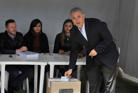 Colombia's President Ivan Duque votes in a seven-question referendum on anti-corruption measures in Bogota, Colombia August 26, 2018. REUTERS/Carlos Julio Martinez