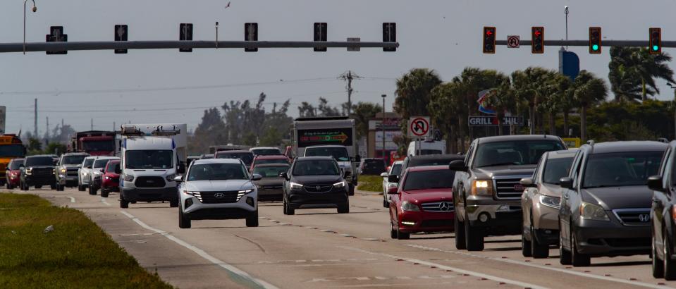 A view of congested traffic along the eastbound lanes of Pine Island Rd. near the Del Prado Blvd. intersection photographed on Tuesday, January 9, 2024.