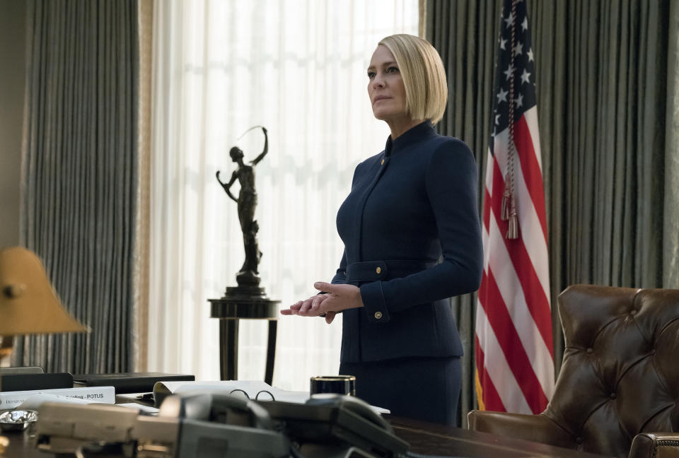This image released by Netflix shows Robin Wright in a scene from the final season of "House of Cards." Robin Wright’s Claire Underwood was always the show’s most enigmatic character and when she became president at the end of season five, she said “My turn” directly to the camera. (David Giesbrecht/Netflix via AP)