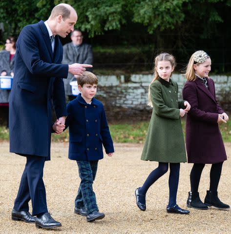 <p>Samir Hussein/WireImage</p> Prince William, Prince Louis, Princess Charlotte and Mia Tindall on Christmas 2023