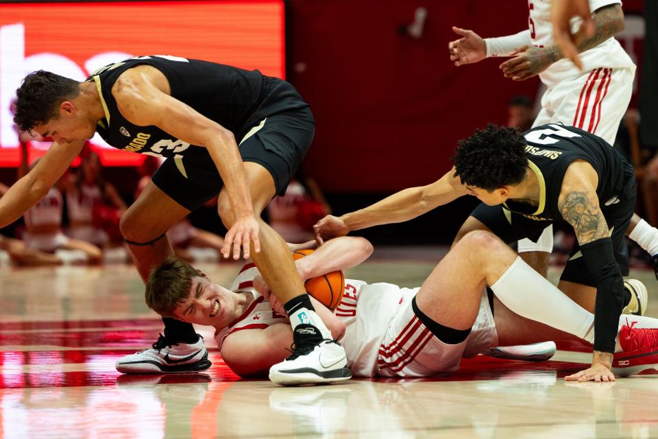 Utah Utes center Lawson Lovering (34) holds onto the ball from the floor of the court during the men’s college basketball game between the Utah Utes and the Colorado Buffaloes at the Jon M. Huntsman Center in Salt Lake City on Saturday, Feb. 3, 2024. | Megan Nielsen, Deseret News