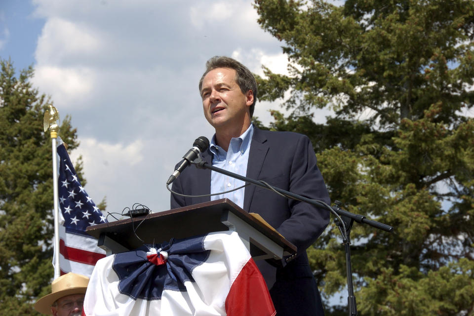 In this Aug. 17, 2017 file photo, Montana Gov. Steve Bullock speaks at an event marking a conservation agreement at a former mining site in Jardine, Mont. Steve Bullock never got to square off directly against President Donald Trump before dropping out of the Democratic presidential primary race last year. But the two-term governor is getting another chance on his home turf by trying to oust a strong Trump ally, first-term Republican Sen. Steve Daines in Montana's U.S. Senate race. (AP Photo/Matthew Brown)