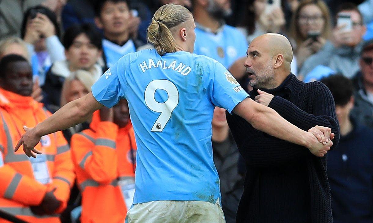 <span>Erling Haaland shows Pep Guardiola his frustration at being substituted.</span><span>Photograph: David Blunsden/Action Plus/Shutterstock</span>