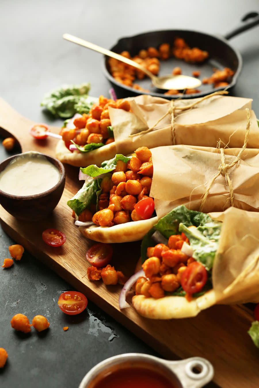 <p>If your kids aren't afraid of a little spice, these wraps filled with a fiery chickpea mix will be a total win. Or, if they're <em>not</em> into hot sauce (understandable!), you can use BBQ instead.</p><p><strong><a rel="nofollow noopener" href="https://minimalistbaker.com/spicy-buffalo-chickpea-wraps/" target="_blank" data-ylk="slk:Get the recipe at Minimalist Baker.;elm:context_link;itc:0;sec:content-canvas" class="link ">Get the recipe at Minimalist Baker.</a></strong></p>