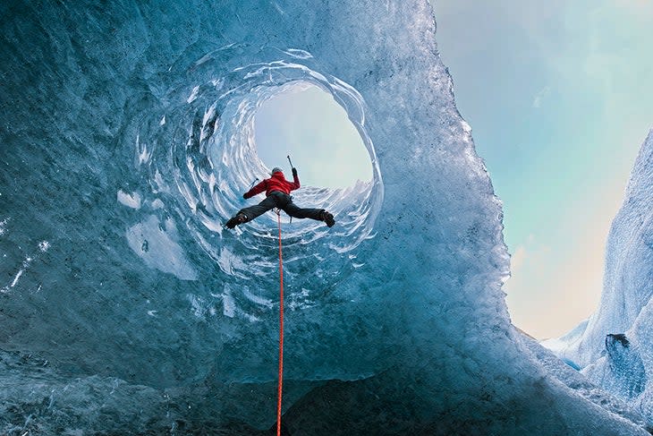 Ice climber in a glacier.