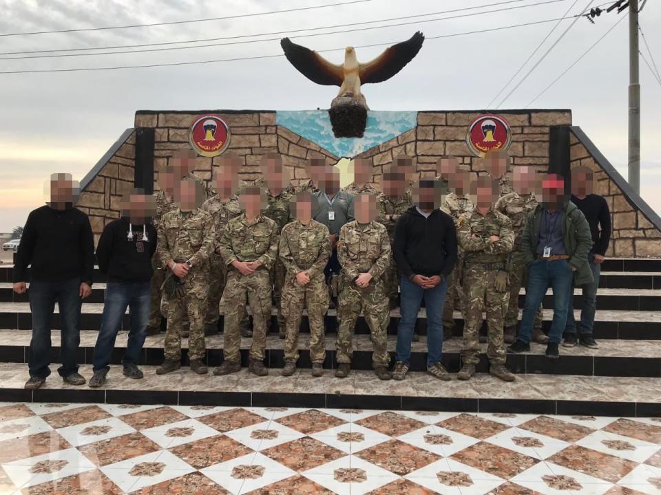 The translators with soldiers at Camp Taji (Faces have been blurred to protect identities)Anonymous