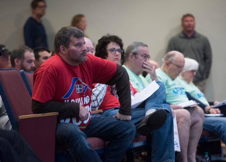 Jonathan Brantley, of Brantley LLC, looks on as the Santa Rosa County Commission listens to comments on topics ranging from impact fees to limiting building growth during the meeting Feb. 25, 2019.