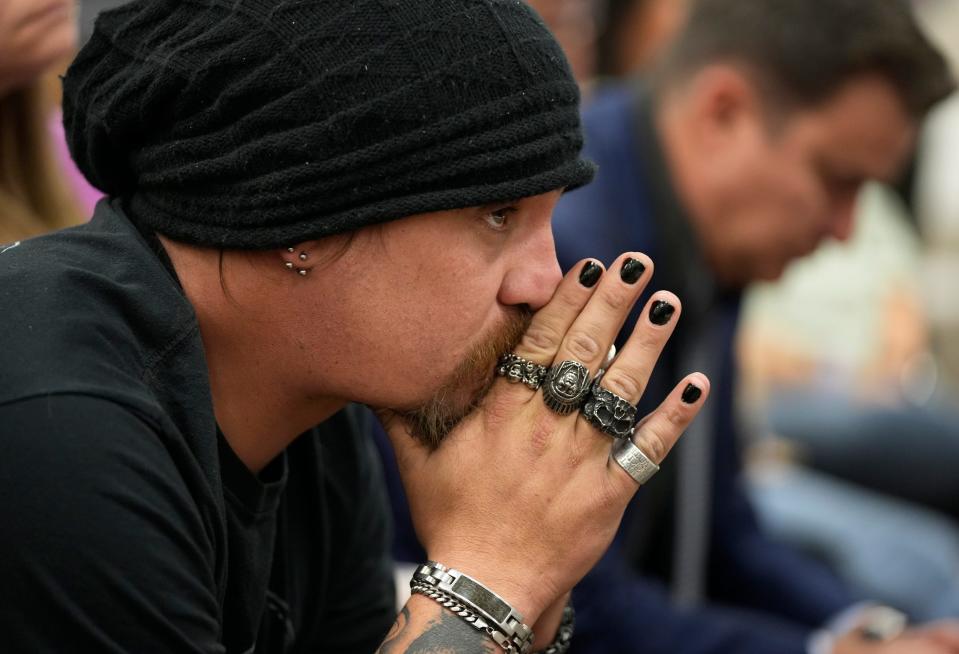 Brett Cross listens to U.S. Attorney General Merrick Garland speak at a Jan. 18 news conference in Uvalde about the poor police response to the 2022 mass shooting at Robb Elementary School.