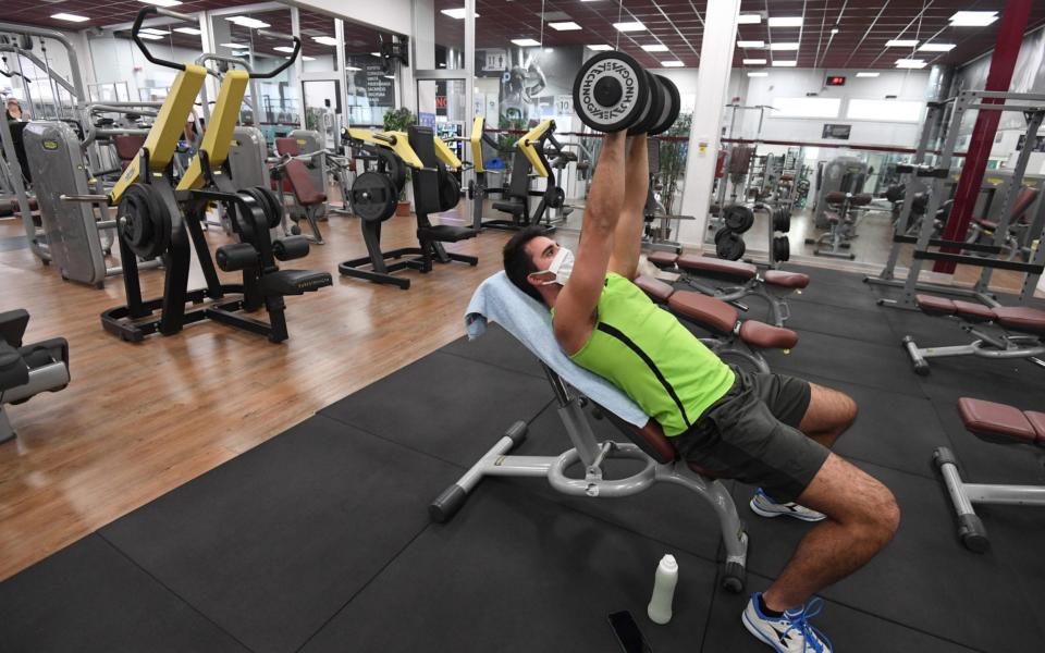 A man in a gym in Italy - Shutterstock