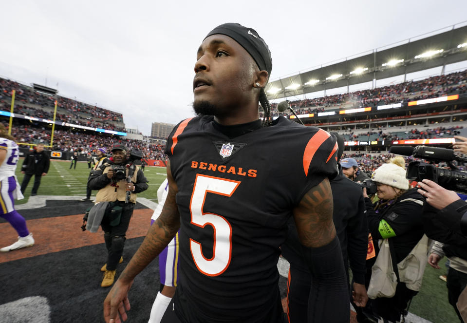 CINCINNATI, OHIO - DECEMBER 16: Tee Higgins #5 of the Cincinnati Bengals celebrates after the game against the Minnesota Vikings at Paycor Stadium on December 16, 2023 in Cincinnati, Ohio. (Photo by Jeff Dean/Getty Images)