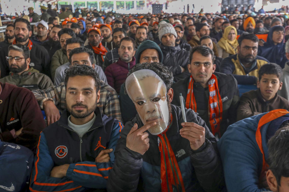 People attend a rally addressed by Indian Prime Minister Narendra Modi at the Bakshi Stadium in Srinagar, Indian controlled Kashmir, Thursday, March 7, 2024. India's Prime Minister Narendra Modi on Thursday made his first official visit to Kashmir's main city since New Delhi stripped the disputed region of semi-autonomy and took direct control of it in 2019. (AP Photo)