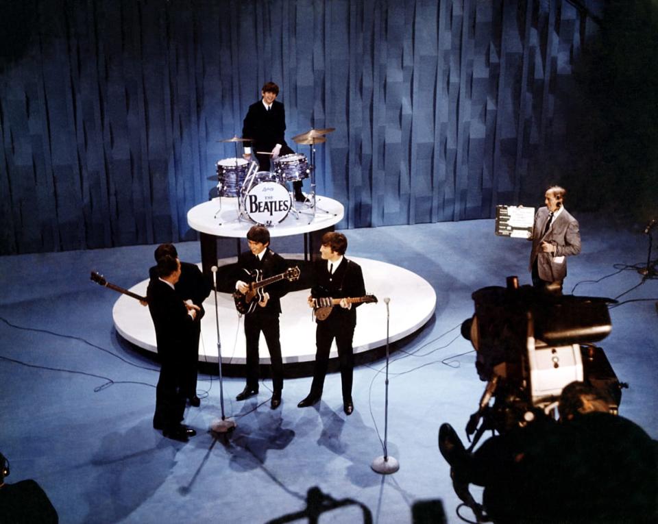 An elevated view of The Beatles performing on an episode of 'The Ed Sullivan Show'