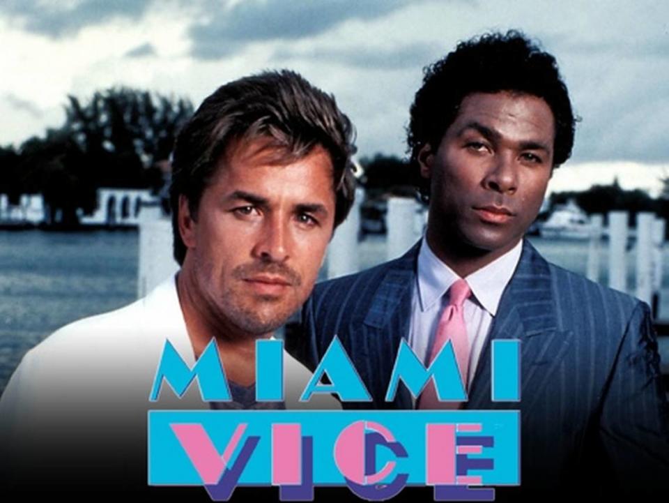 The Miami Vice logo and stars Don Johnson as Det. John “Sonny” Crockett (left) and Philip Michael Thomas as Det. Ricardo Tubbs (right). The crime drama aired on NBC Friday nights from 1984 to 1989.