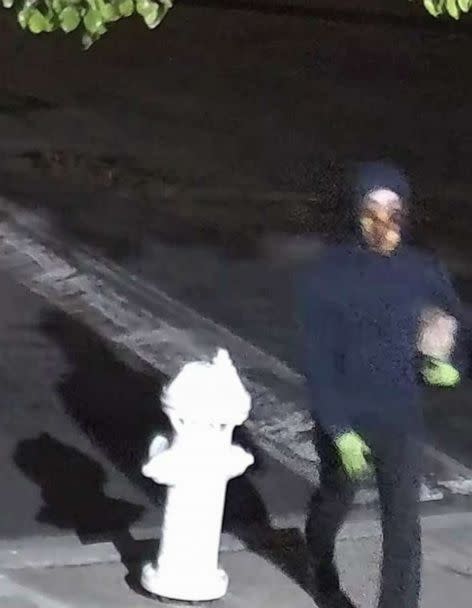 PHOTO: In this image released by the FBI, a person is shown who is a suspect in the throwing of a the Molotov cocktail at a building used by Planned Parenthood, in Costa Mesa, Calif., on March 13, 2022. (FBI)