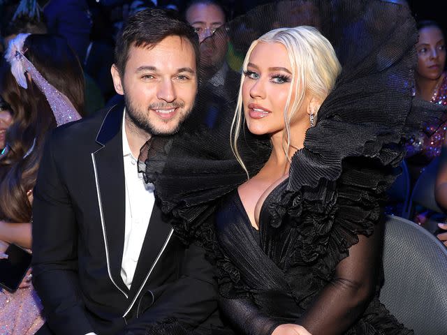 <p>Rodrigo Varela/Getty</p> Matthew Rutler and Christina Aguilera at the 23rd Latin Grammy Awards in November 2022.