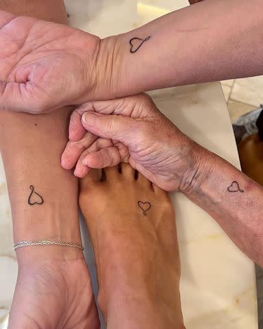 <p>Carrie Underwood Instagram</p> Carrie Underwood's matching tattoos with her mom and sisters.