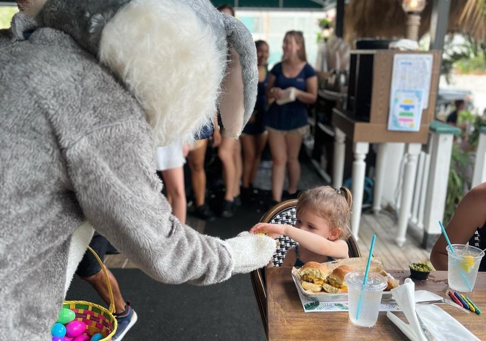 The Easter Bunny pays a special visit to one young diner during E.R. Bradley's Easter Sunday brunch in 2023. The downtown West Palm Beach waterfront restaurant will bring back the holiday brunch this Easter Sunday, March 31.