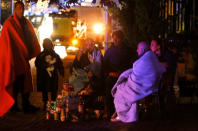 People prepare to spend the night in the open following an earthquake in Amatrice, central Italy, August 24, 2016. REUTERS/Ciro De Luca