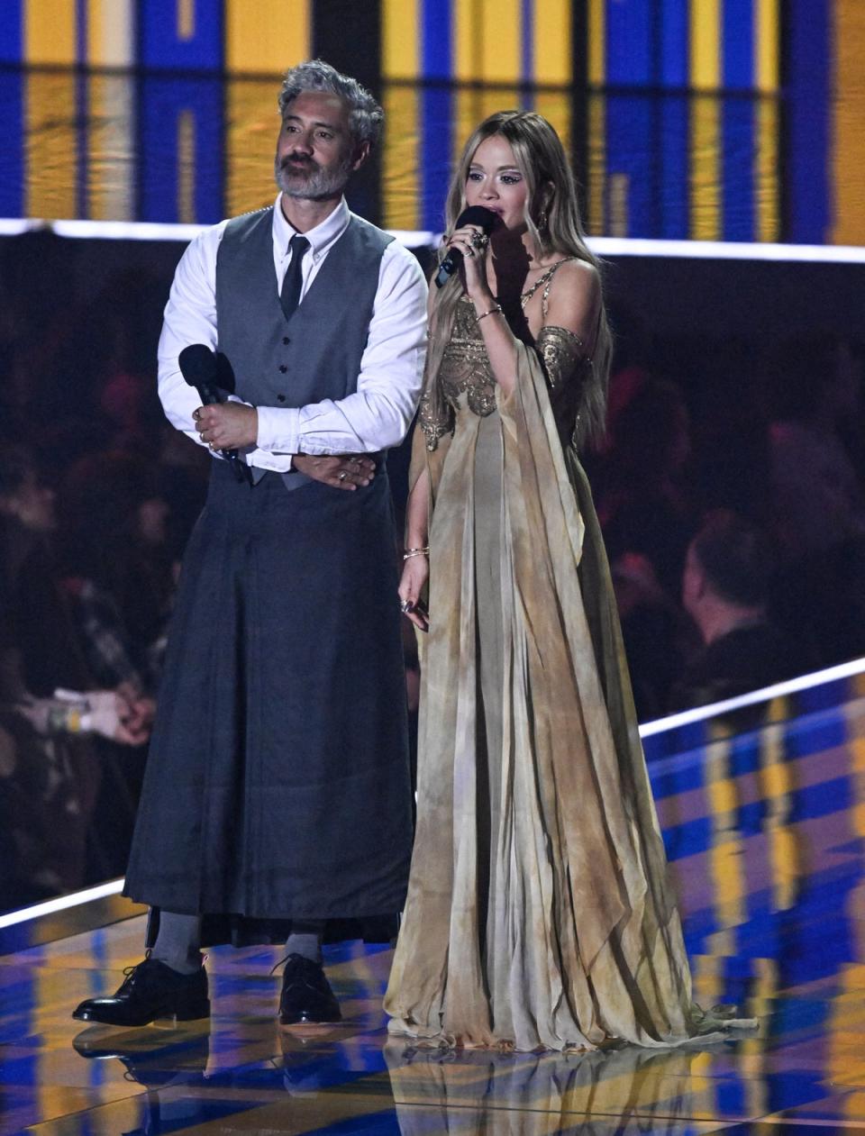Taika Waititi and Rita Ora at the 2022 MTV EMAs (AFP via Getty Images)
