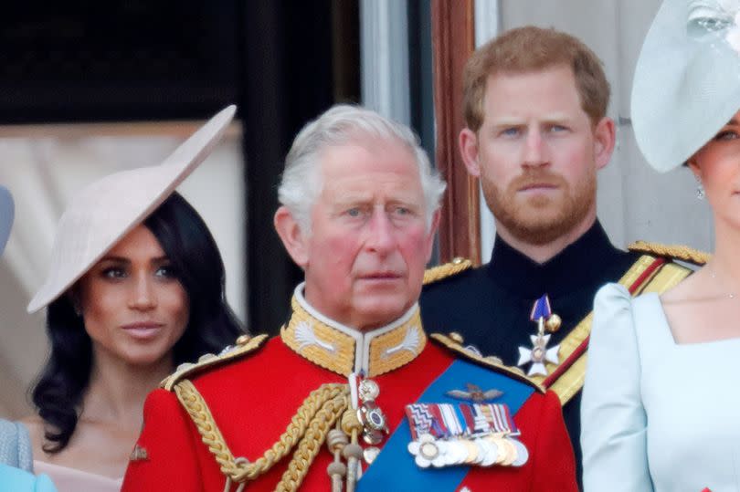A royal expert claims Charles is sending a 'clear message' to Harry and Meghan -Credit:Getty Images