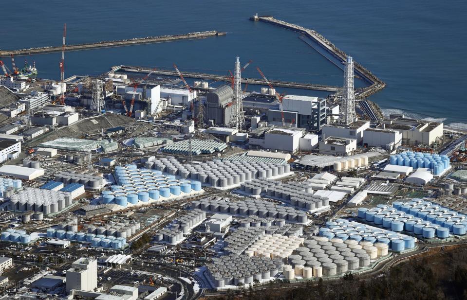 An aerial photo shows Fukushima Daiichi nuclear power plant in Okuma town, Fukushima Prefecture in January, 2021. The Japanese government has decided to get rid of the massive amounts of treated but still radioactive water stored in tanks at the wrecked Fukushima nuclear plant by releasing it into the Pacific ocean, a conclusion widely expected but delayed for years amid protests and safety concerns. Prime Minister Yoshihide Suga on Wednesday, April 7, 2021, told top fisheries association officials that his government believes the release to sea is the most realistic option and a final decision will be made “with days.”(Kota Endo/Kyodo News via AP)