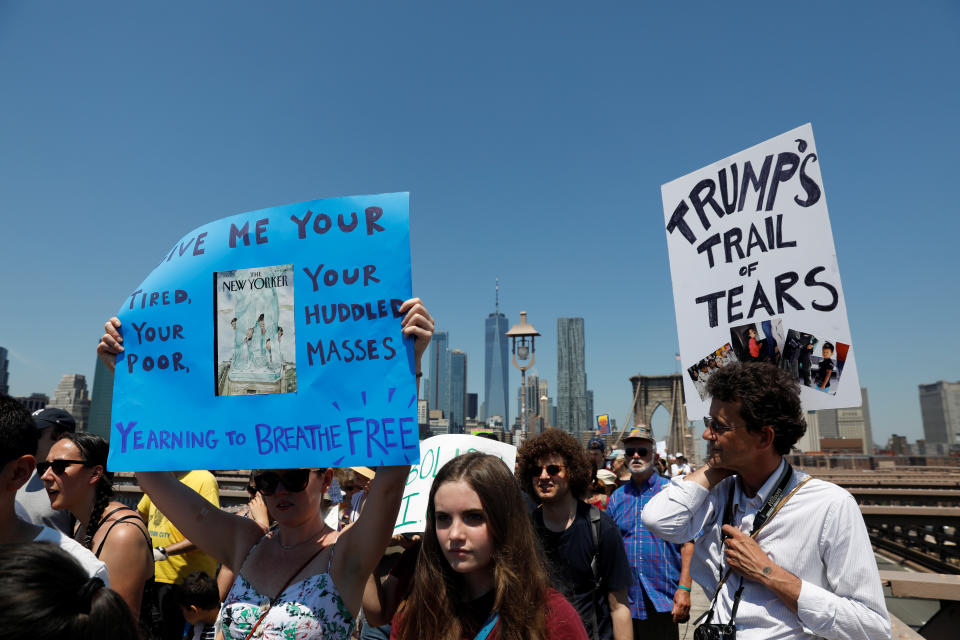 <p>Demonstrators cross the Brooklyn Bridge during “Keep Families Together” march to protest Trump administration’s immigration policy in New York, June 30, 2018. (Photo: Shannon Stapleton/Reuters) </p>